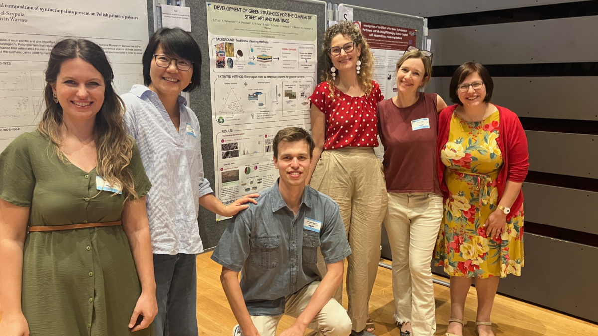 GoGreen members pose in front of poster by Silvia Prati at the CHEMCH2024 conference in Bratislava